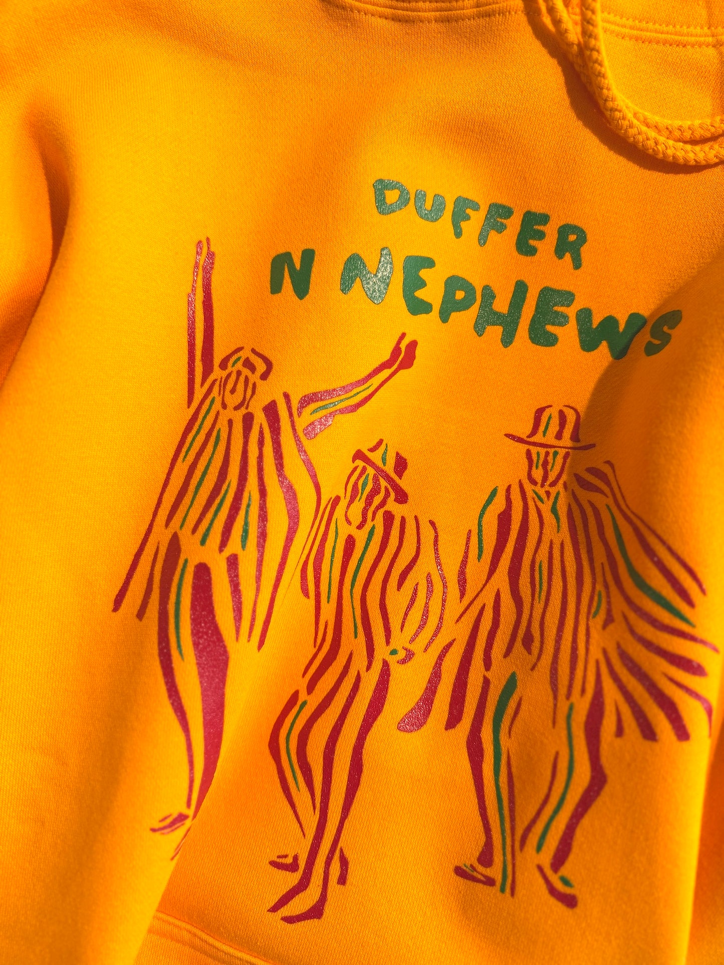 The DUFFER N NEPHEWS　"PAN AFRICAN PRINT HOODIE" -gold-